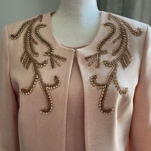 Two piece dress jacket set very modest.  Worn once in excellent condition